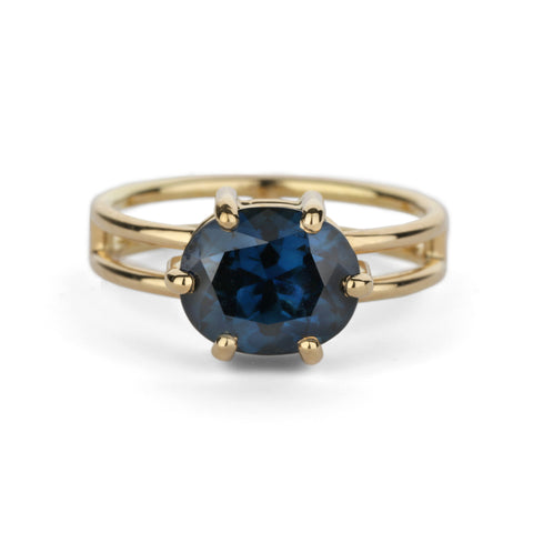 Shimell & Madden Oval Blue Sapphire Six Claw Split Ring